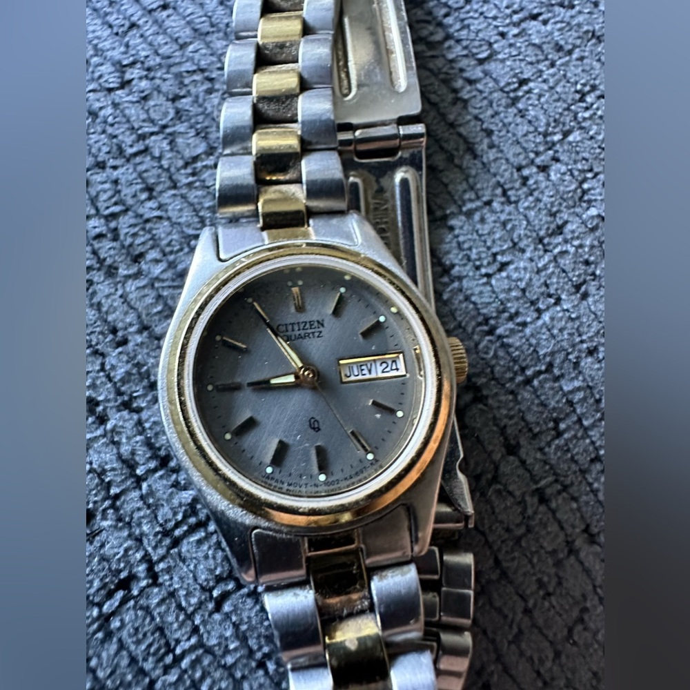 Woman’s Citizen quartz watch.